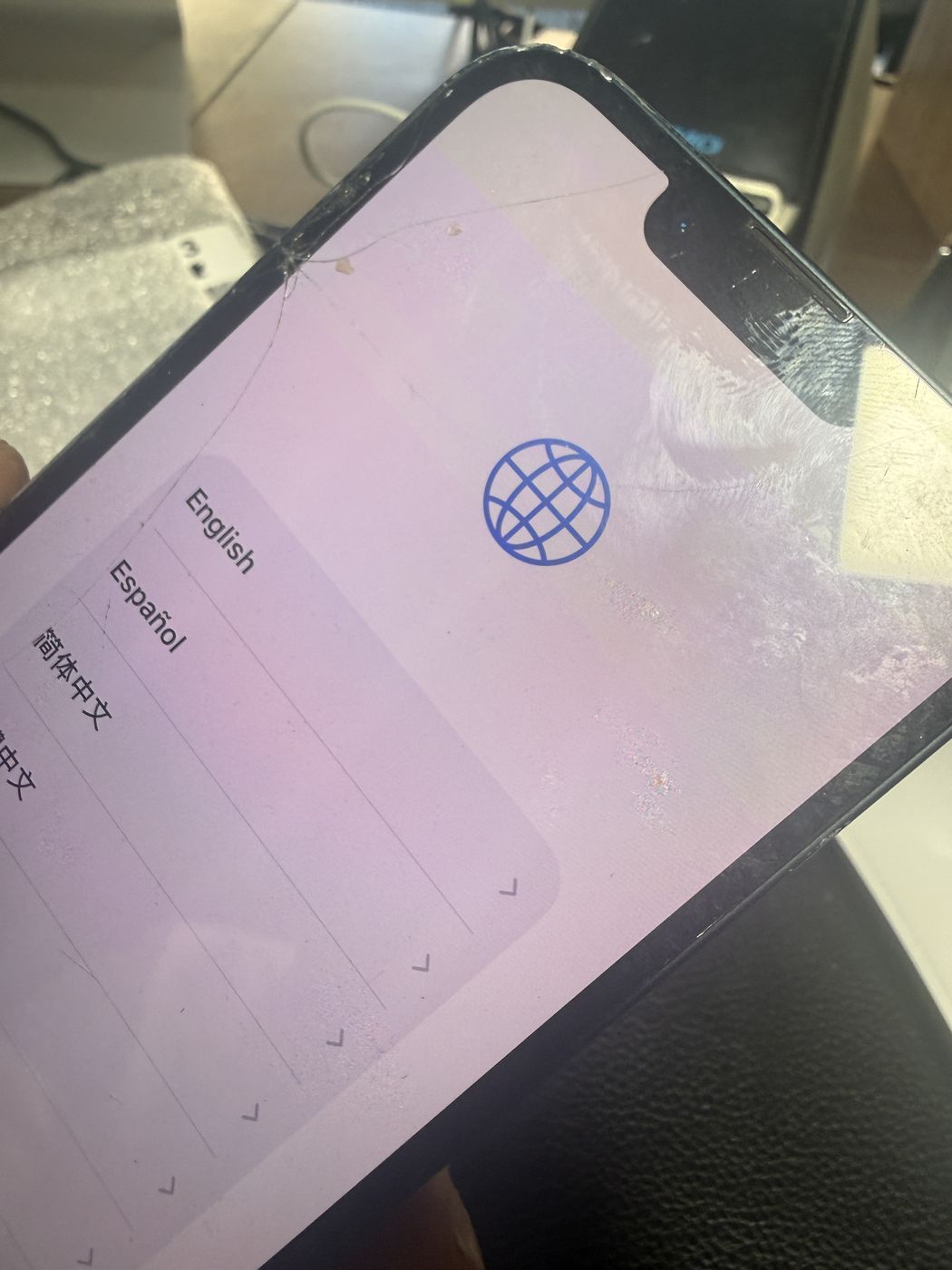 Sell cracked iPhone Portland — cracked iPhone screen during a buyback inspection